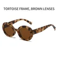 Retro round tortoiseshell sunglasses with brown lenses in a marble stone pattern frame - Tortoise Frame Tea Lens