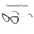 Occhiali cat-eye con montatura tartarugata e stanghette metalliche dorate ondulate su bianco - Montatura Tartarugata