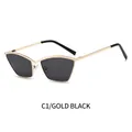 Occhiali da sole cat-eye con montatura in metallo dorato e lenti grigio scuro stile retrò - Montatura Oro Nero Grigio