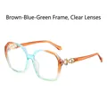 Square oversized sunglasses with tea, blue, and green gradient frame and gold hardware - Tea Blue Frame Clear Lens