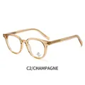 Occhiali rotondi anti-luce blu eleganti con finitura in oro champagne chic - Montatura Champagne
