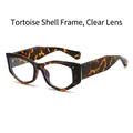 Lunettes œil de chat écaillé tendance avec verres clairs et larges branches métalliques - Monture Demi Verres Transparents