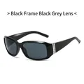 Occhiali da sole ovali neri con lenti grigie e aste decorate con strass brillanti - Montatura Nero Lucido Lente Grigia