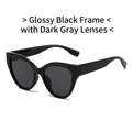Cat eye sunglasses with glossy black frame and dark grey lenses for a retro chic look - Glossy Black Frame Grey Lens