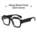 Gepolijste zwarte zeshoekige zonnebril met transparante glazen voor een trendy look - Glanzend Zwart Frame / Heldere Lenzen
