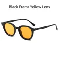 Retro oval sunglasses with minimalist black frames and stylish yellow transparent lenses - Glossy Black Frame Orange Lens