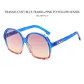 Blue tortoiseshell oval sunglasses with pink and yellow gradient lenses and gold temple - Blue Tortoiseshell Frame / Pink Yellow Lenses