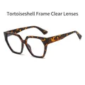 Polygonal tortoise shell frame sunglasses with clear lenses for a trendy retro look - Demi Frame Clear Lens