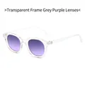 Retro oval sunglasses featuring transparent frames and gradient gray-purple lenses - Transparent Frame Gray Purple Lenses