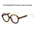 Retro round sunglasses with tortoiseshell frames and gold metal temples in 45-degree view - Tortoise Frame Clear Anti-Blue Light Lens (Optical Glasses)