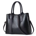 Classic dark brown leather tote bag with top handles and adjustable shoulder strap - Black