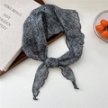 Elegant black and white floral lace neck scarf with knotted styling and wavy edges - Black Leaf Net Floral