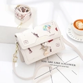 Cream crossbody bag with illustration prints and dual stylish shoulder straps - Off-white
