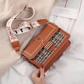 Brown canvas patchwork handbag with star buckle and snowflake woven shoulder strap - Earthy Yellow