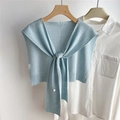 Detailed knit of light blue shawl with subtle silver sequins on white shirt - Light Blue