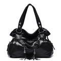 Chic black lychee texture PU leather tote bag with silver hardware and punk tassels - Black