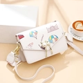 Sac bandoulière blanc à motifs voyage colorés et fermoir perle en forme de chat - Blanc