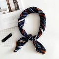 Navy linen scarf with orange chain print and yellow stitching in a knotted style - Chain Navy Blue