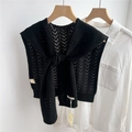 Detail of black hollow-out knitted shawl with V-pattern lace and stylish front knot - Black