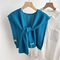 Detail of royal blue knit shawl with V-pattern texture and knot over white shirt - 43x100cm / Sapphire Blue