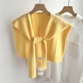 Detail of yellow knitted shawl with vertical stripe texture and tie-knot over white shirt - 48*95cm / Yellow