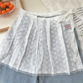 Detail of white floral lace overlay skirt with satin ribbon tie on blue denim - Tie Wrap Skirt / White (Double Flower Style)
