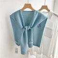 Close-up of light blue hollow knit shawl with floral crochet details and tie design - Light Blue