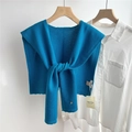 Detail of royal blue wool knitted shawl with metal button on a white shirt - 43x110cm / Dark Blue