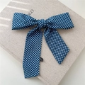 Détail d'un ruban à cheveux à pois bleu marine en tissu de qualité 100% polyester - Bleu à Pois