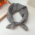 Chic beige cotton linen neckerchief with black floral pattern tied as a bow headband - Scarf Style / Floral Beige