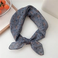 Floral cotton linen scarf in dark grey with vintage flower print tied in a bow knot - Scarf Style / Plumeria Grey