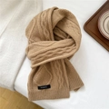Close-up of camel wool scarf showing premium cable knit texture and 100% wool label - 20*170cm / Camel