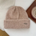 Close-up of thick knit beanie texture with a metal brand logo label on soft fabric - One Size (22*25cm) / Apricot (Metal Label)