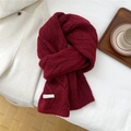 Detail view of burgundy chunky knit wool scarf featuring textured diamond patterns and label - Wine Red (7BOWLOW Hollow Hexagon Wine Red)
