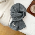 Detail of soft grey wool blend knitted scarf with BOWLOW label on a cozy winter background - Dark Grey (8BOWLOW Hollow Hexagon Dark Grey)
