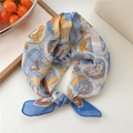 Blue and yellow cotton linen neckerchief featuring a vintage camping theme print - Camp Badge Blue