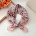 Pink leopard print cotton linen square scarf tied in a knot for stylish neck accessory - Leopard Print Pink