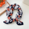Navy blue cotton linen neck scarf with orange floral pattern in a knotted loop style - 4 Cotton-Paper Flower Navy (Tulip)
