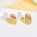 Detail of gold heart stud earrings with unique hammered texture and wavy surface design - 3D Wavy Pleated Heart Style (EH013)