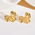 Close-up of golden bow-shaped stud earrings featuring a detailed striped metal texture - Fine Striped Bowknot Style (EH039)