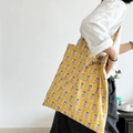 Eco-friendly yellow cotton tote bag with green floral block print and slim straps - Standard Large / Gardenia Yellow