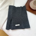 Detail of dark grey 100% wool knitted neck warmer featuring a split design and quality label - Gray (WB0013)