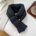 Close-up of black padded puffer scarf with gold metal button closure on cozy knit bedding - Black (Double Metal Button Style)