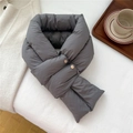 Detail of dark grey puffer scarf featuring thick padding and decorative wooden buttons - Grey (Double Metal Button Style)