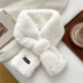 Detail of white faux fur scarf with soft plush texture and elegant cross-over design - Cream