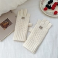 Detailed knit texture of cream-colored convertible mittens with diamond hollow pattern - Cream