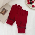 Detail of dark red knit gloves with thick grey stitching and elastic ribbed cuffs - Dark Red (Grey Stitching)