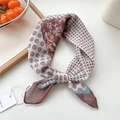 Brown and beige floral cotton-linen scarf tied in a knot on a white minimalist background - Four Grid Floral Polka Dot Coffee