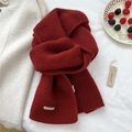 Detailed texture of dark red rib-knit wool scarf with brand label and wooden tag - 22*160cm / Red