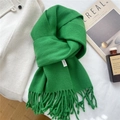 Detail of green 100% wool scarf showing high-quality twill weave texture and tassels - 39*190cm / Green